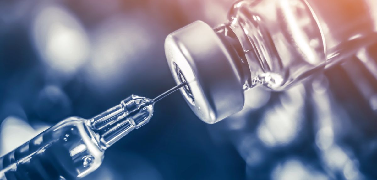Close up image of a single vaccine dose being prepared from a vial. Image credit: Shutterstock.