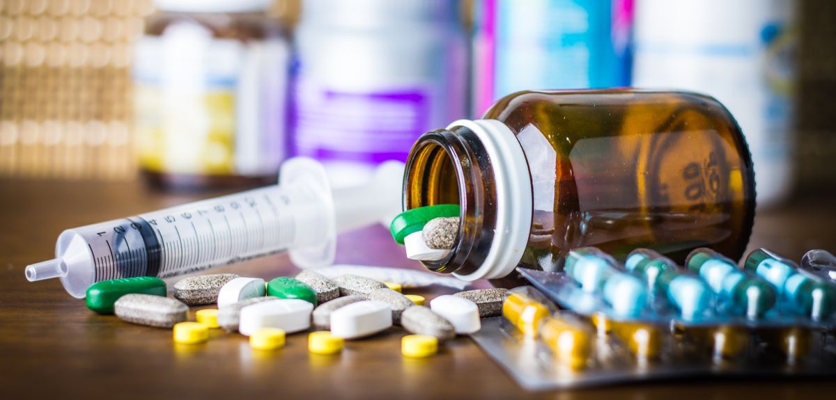 Prescription drugs spilled on table