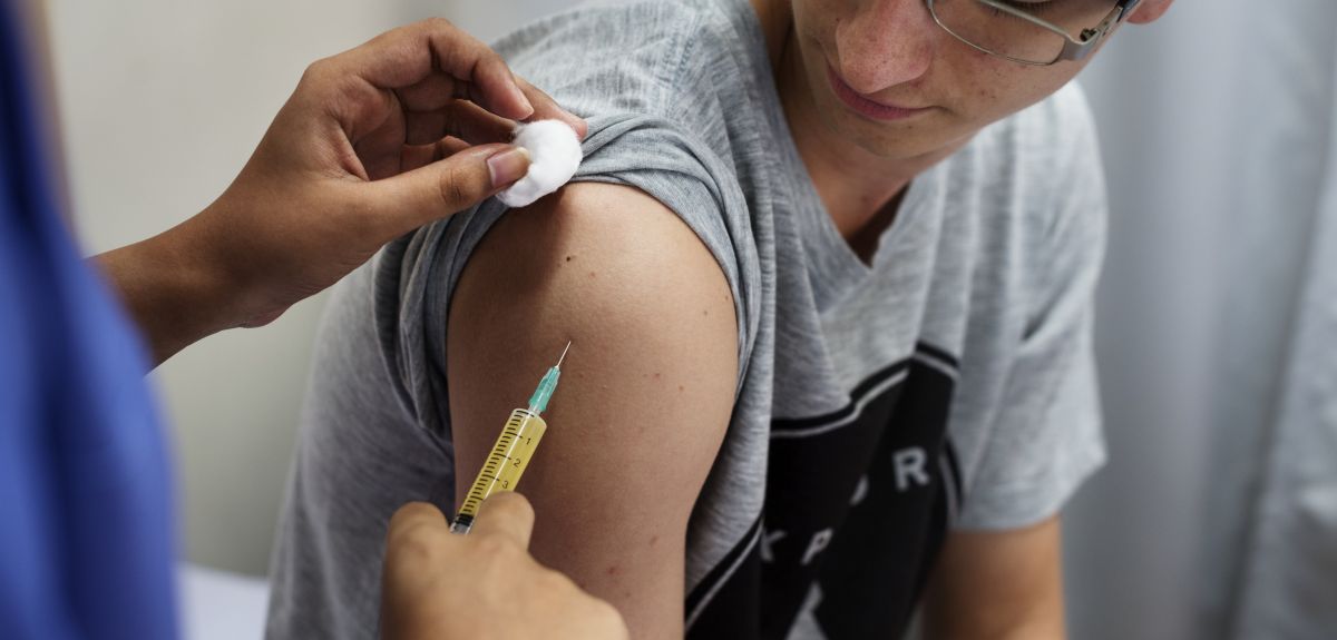 Student getting vaccinated.