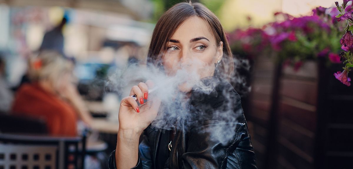 Woman using e-cigarette