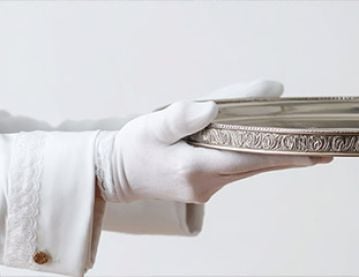 Waiter carrying tray