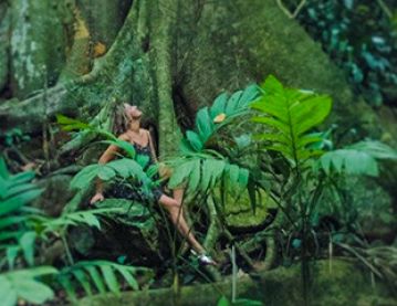 Woman in rainforest