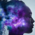 An artistic image showing a side view of a woman’s head, which is coloured with a night-time cloudscape scene. Image credit: Shutterstock.