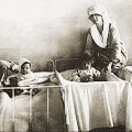 A historical photo of nurses and babies in a nursery. Image credit: Shutterstock.