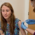 A volunteer receives the Ebola vaccine as part of a trial at Oxford University