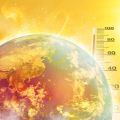 Cartoon showing the Earth with a thermometer overlaid against a fiery yellow background.