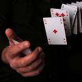 Playing cards with quantum states