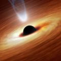 Artist's concept illustrates a supermassive black hole with millions to billions times the mass of our sun