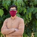 Man wears a cloth face mask