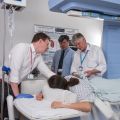 Dr Paul Lyon, Professor Feng Wu and Professor David Cranston with a patient in the HIFU unit in Oxford