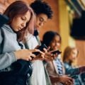 Teenagers on mobile phones. Credit: Drazen Zigic, Getty Images