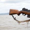  Weapon on man's shoulder at Lake Chamo, Ethiopia. Credit: Joel Carillet, Getty Images