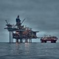 North Sea oil and gas platform in the sea at dusk. Credit: Igors Aleksejevs, Getty Images