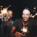 Two students holding sparklers